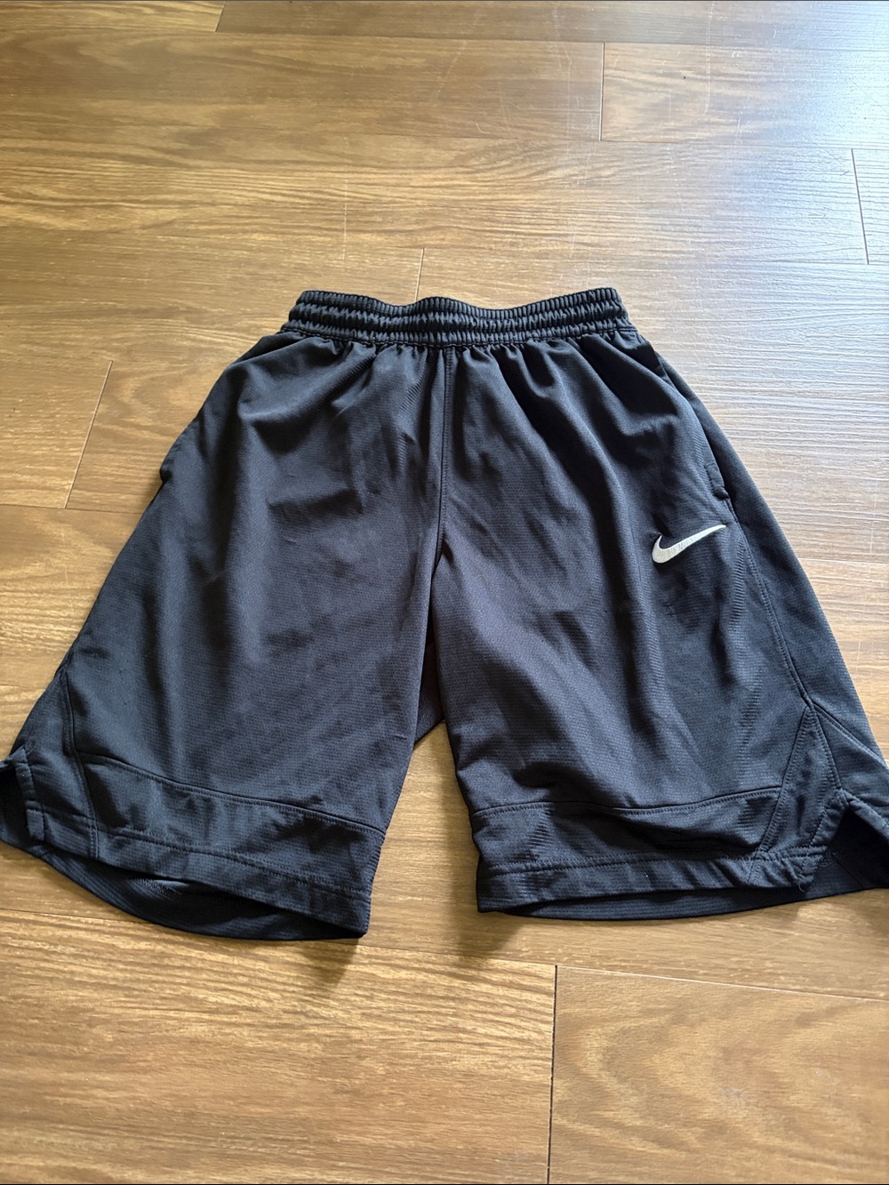 Nike Black Mesh Athletic Shorts with White Swoosh